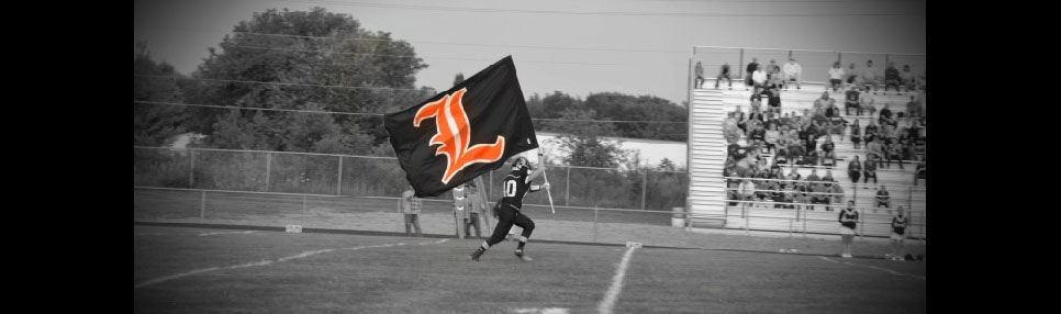 Football player running with Leslie flag