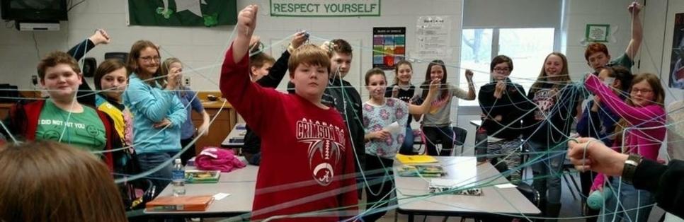 Middle School Students using string
